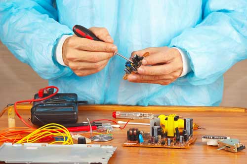 Electronic Tech Industrial Circuit Board Repair and Rework Services Technician Fixing Circuit Board